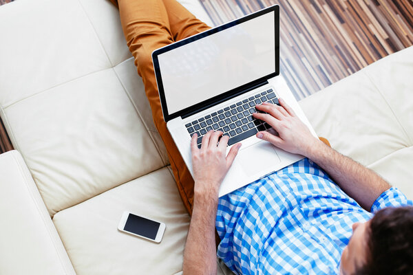 Man sitting on a sofa