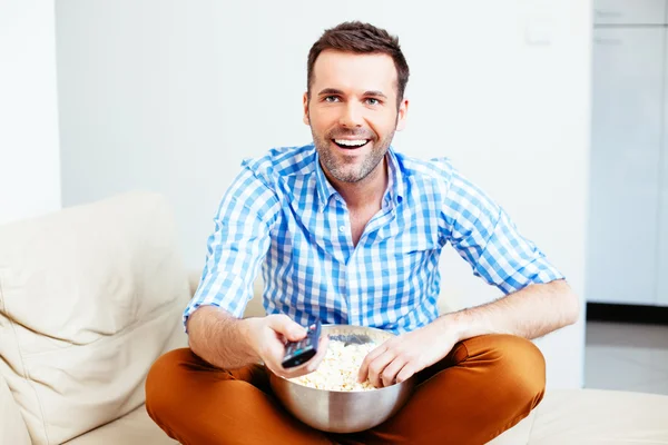 Man with a remote control — Stock Photo, Image