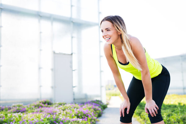 Happy sports woman laughing 