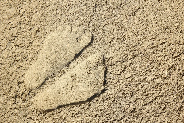 Footprints on sand  beach — Stock Photo, Image