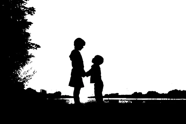 Silhouette bambini felici — Foto Stock