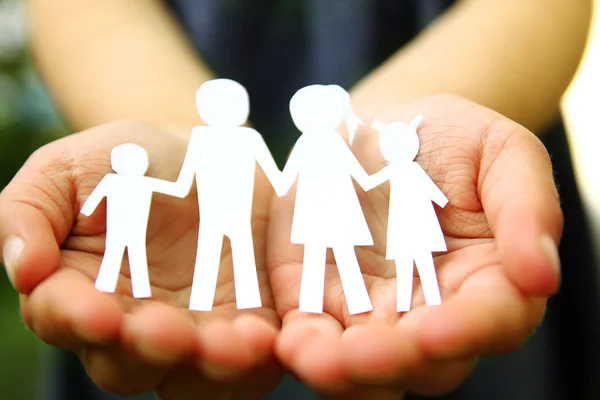 Hands holding family sign — Stock Photo, Image