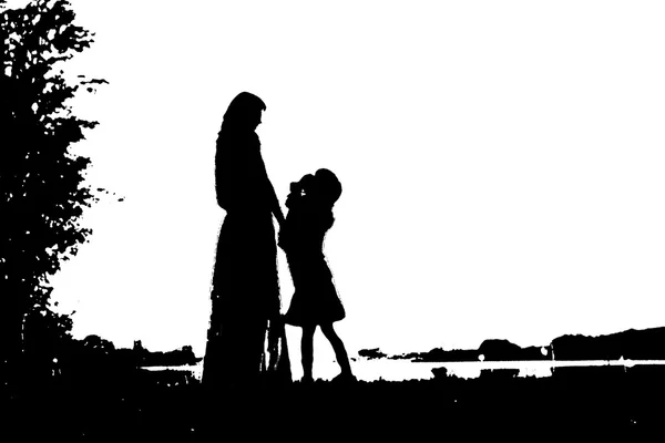 Silhouettes of mother with baby — Stock Photo, Image