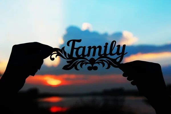 Rodina se přihlásit na rukou — Stock fotografie