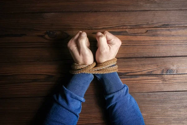 Hands Tied Rope Life Threatening Wooden Background Slavery Business Human — Stock Photo, Image
