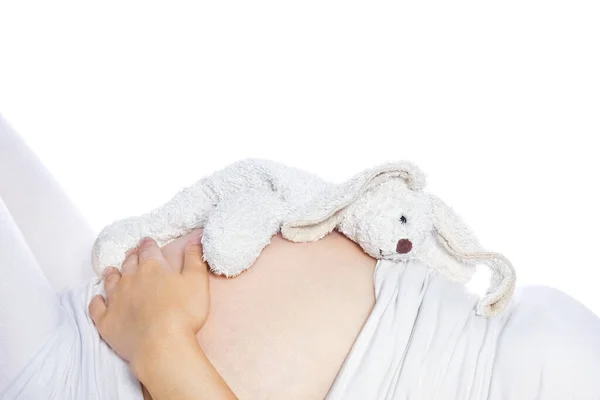 Счастливая Беременная Девушка Лежит Белом Фоне — стоковое фото