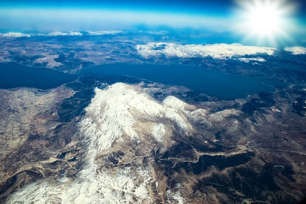 Beautiful earth and sea from a window airplane background