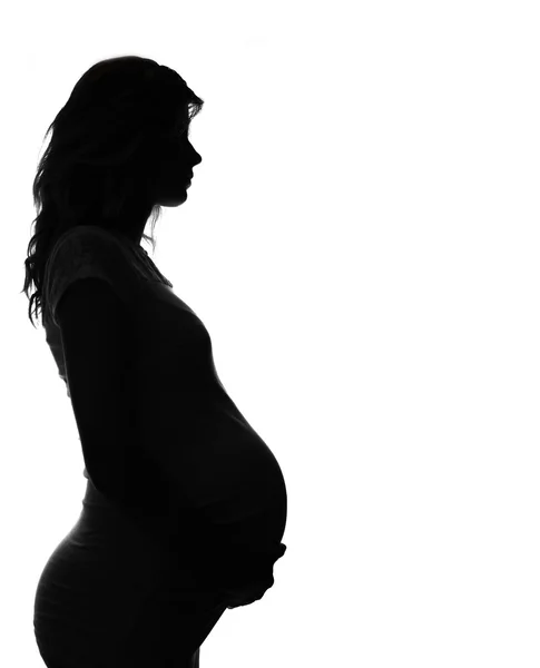 Silhouette einer schwangeren Frau — Stockfoto