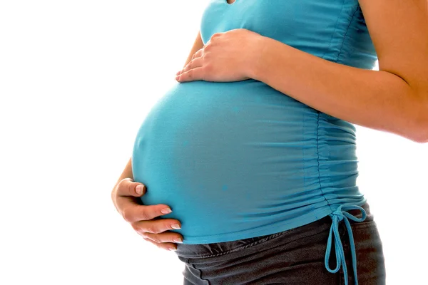 Barriga feminina grávida — Fotografia de Stock