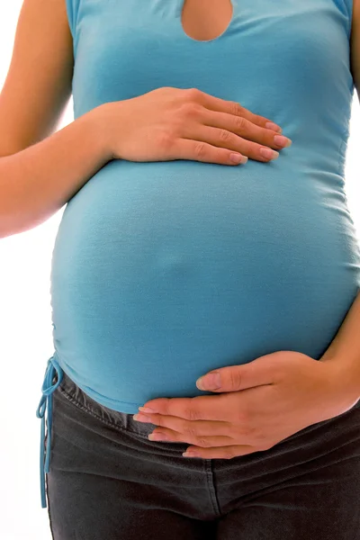 Barriga feminina grávida — Fotografia de Stock