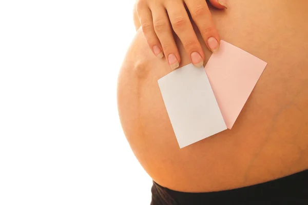 Gravida kvinnans mage med klistermärke — Stockfoto