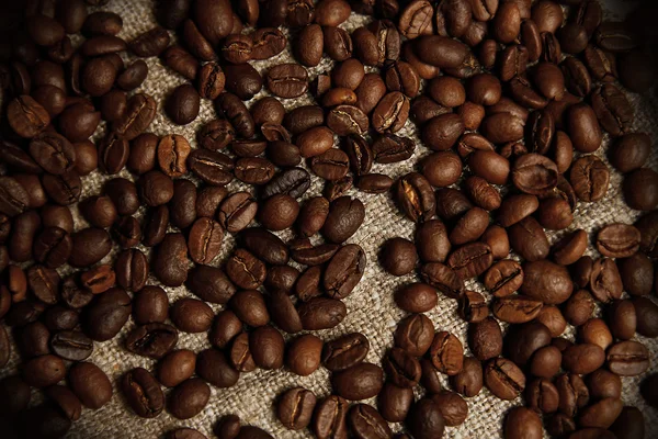 Koffiebonen op doek — Stockfoto