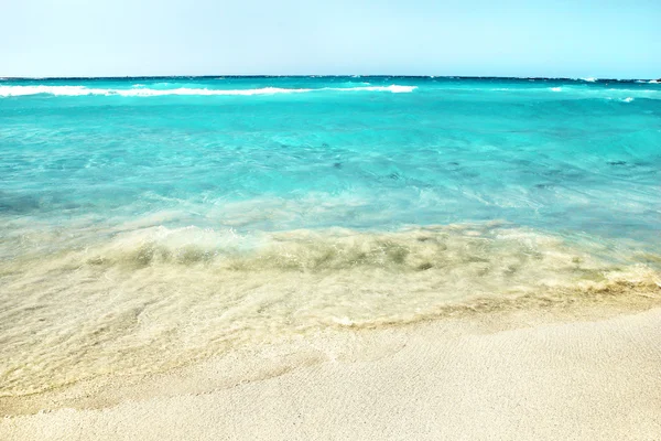 Sandy beach with wave — Stock Photo, Image