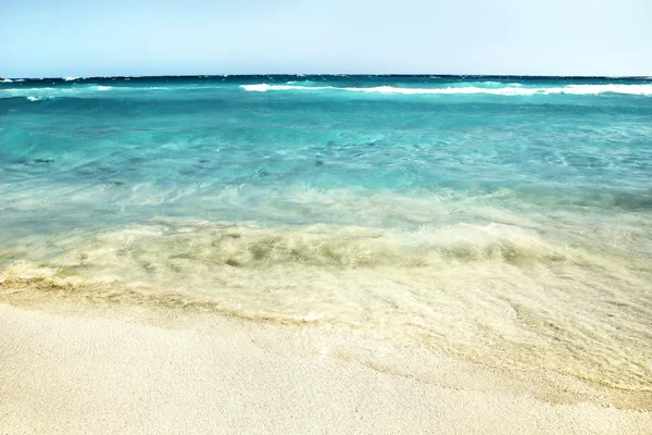 Sandy beach with wave — Stock Photo, Image