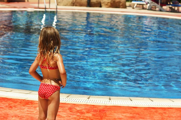 Child near swimming pool — Stock Photo, Image