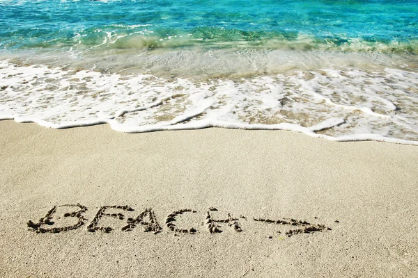 The inscription on the sand seashore — Stock Photo, Image