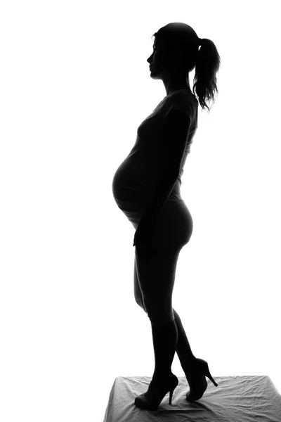 Donna incinta silhouette — Foto Stock
