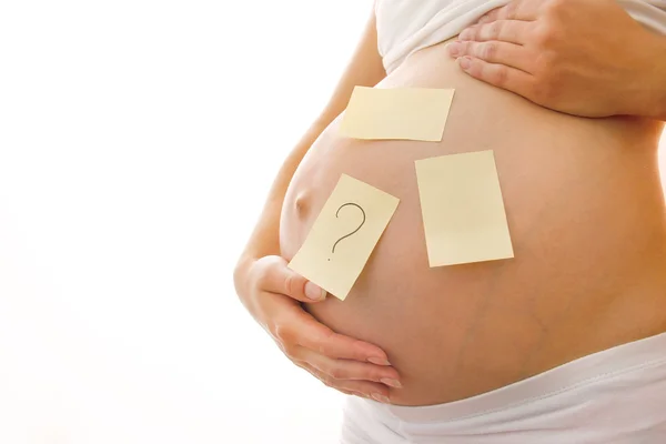 Terhes nő a háttérben — Stock Fotó
