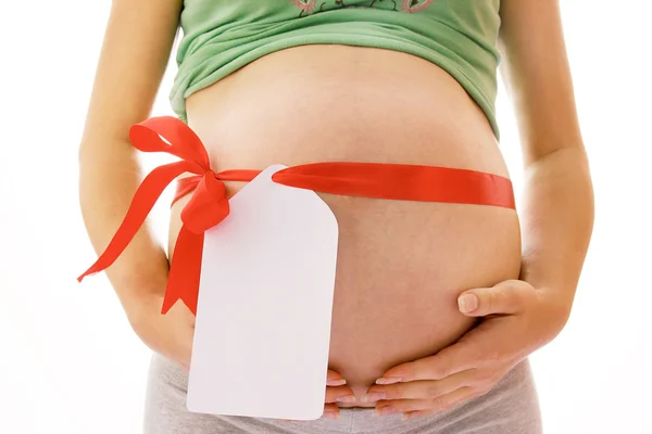 Pregnant woman  with bow — Stock Photo, Image