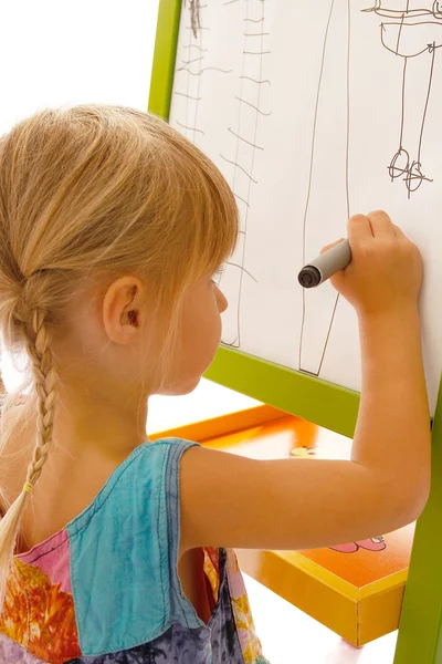 Child drawing on the board — Stock Photo, Image