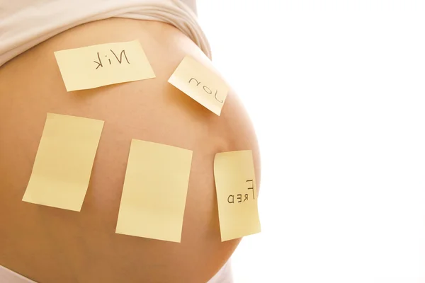Pregnant woman with stickers — Stock Photo, Image