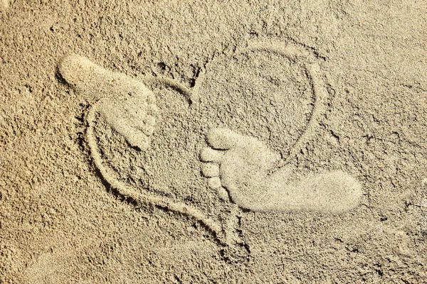 Voetafdrukken op strand zand — Stockfoto
