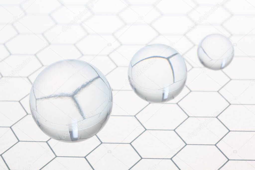 three transparent balls shperes flying on an honeycomb glass pattern with copy space for your text