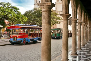 View of ytansport on main square in Campeche, Mexico. clipart