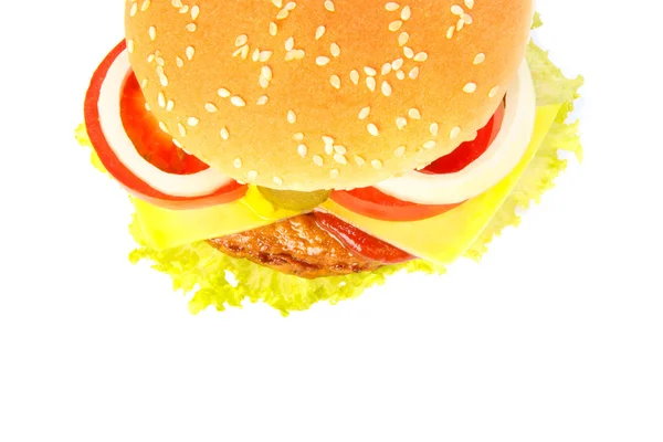 Vista dall'alto di un hamburger con formaggio, sottaceti, cipolla, pomodoro e saù — Foto Stock