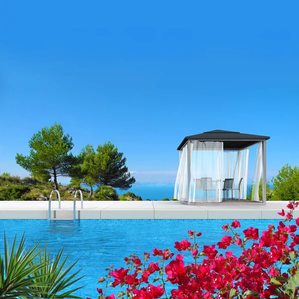 Piscine avec pavillon et bougainvilliers — Photo