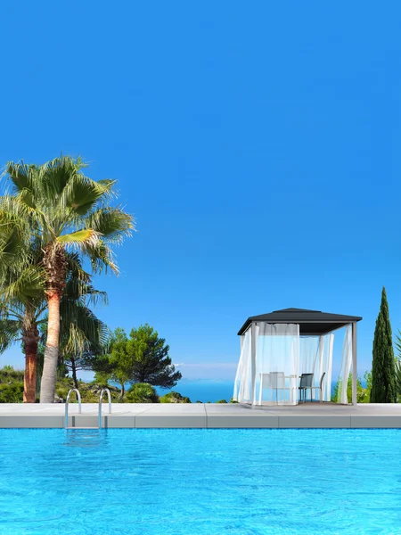 Swimming pool, palms, cypress and pavilion — Stock Photo, Image