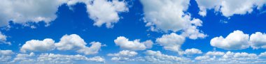 Beautiful sky with white fleecy clouds clipart