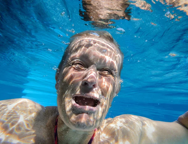 Woman crying under water — Stock Photo, Image