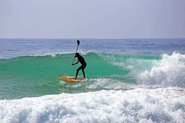 Stand up paddle boarding on the atlantic ocean — Stock Photo, Image