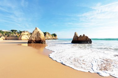 Beach in Alvor Portugal clipart