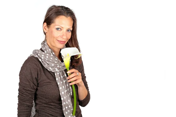 Mature woman with cala flowers — Stock Photo, Image