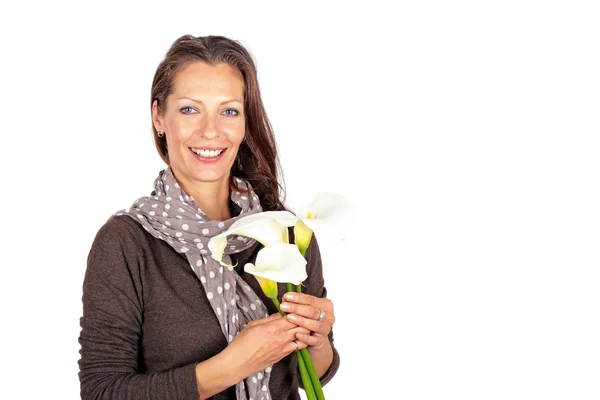 Mature woman with cala flowers — Stock Photo, Image