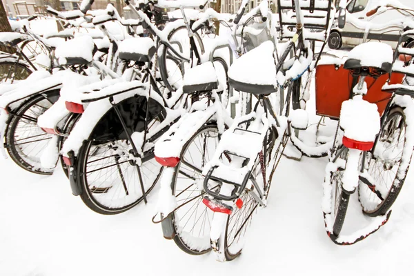 Bicycles covered with snow — Stock Photo, Image