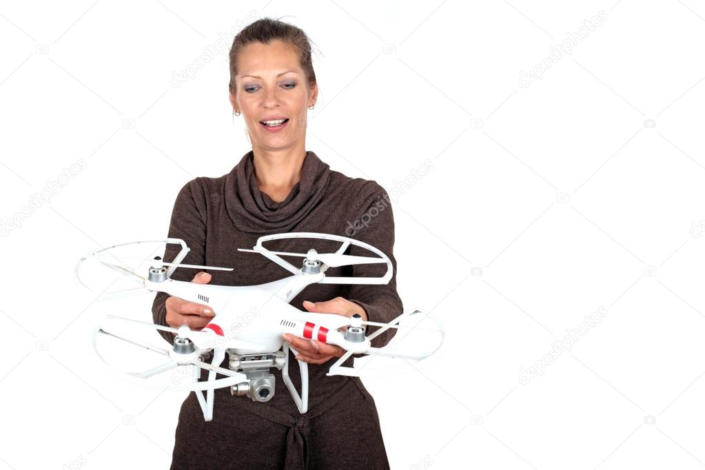 Beautiful woman with a drone