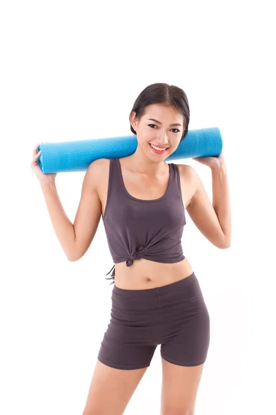 Fitness mujer con mano celebración yoga mat — Foto de Stock