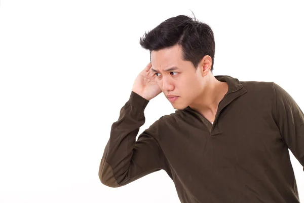 Worried, unhappy, nervous man listening to bad news, studio shot — Stock Photo, Image