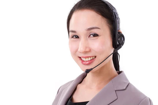 Feliz mujer servicio al cliente cara ejecutiva primer plano con auriculares — Foto de Stock