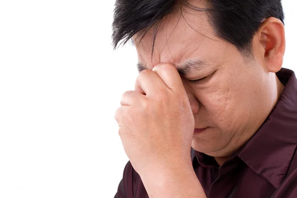 Muž středního věku, trpí bolestí hlavy — Stock fotografie