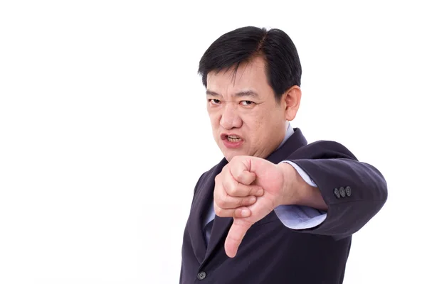 Angry, upset, serious businessman giving thumb down — Stock Photo, Image