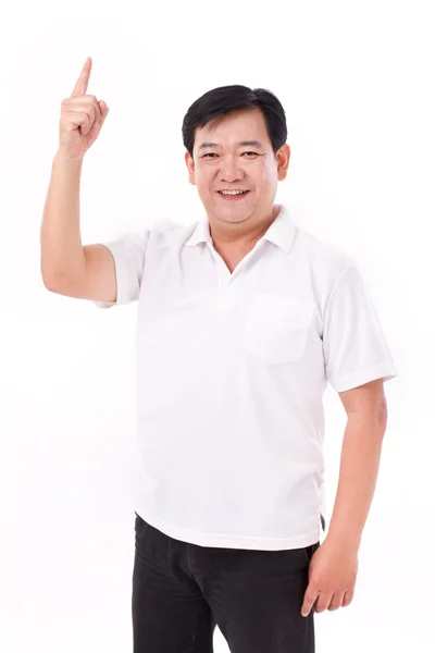 De mediana edad asiático hombre apuntando hasta espacio en blanco —  Fotos de Stock