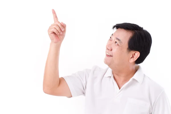De mediana edad asiático hombre apuntando hasta espacio en blanco — Foto de Stock