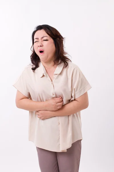 Middelste leeftijd vrouw last van buikpijn, pijn in buik, menst — Stockfoto