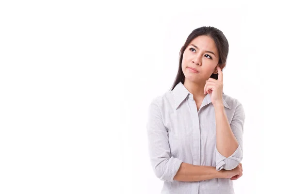 Kvinna tänkande, tittar upp med stressande uttryck — Stockfoto