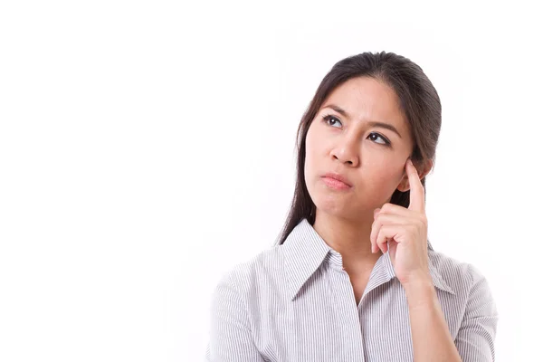 Kvinna tänkande, tittar upp med stressande uttryck — Stockfoto