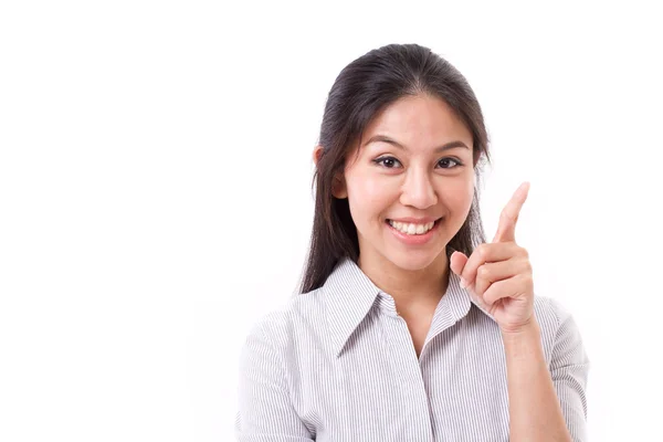 Gelukkige vrouw die haar vinger omhoog wijst — Stockfoto